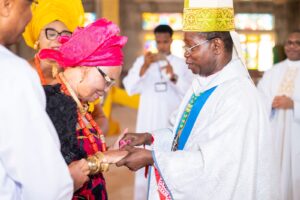 Archbishop Nwachukwu blessing the celebrant