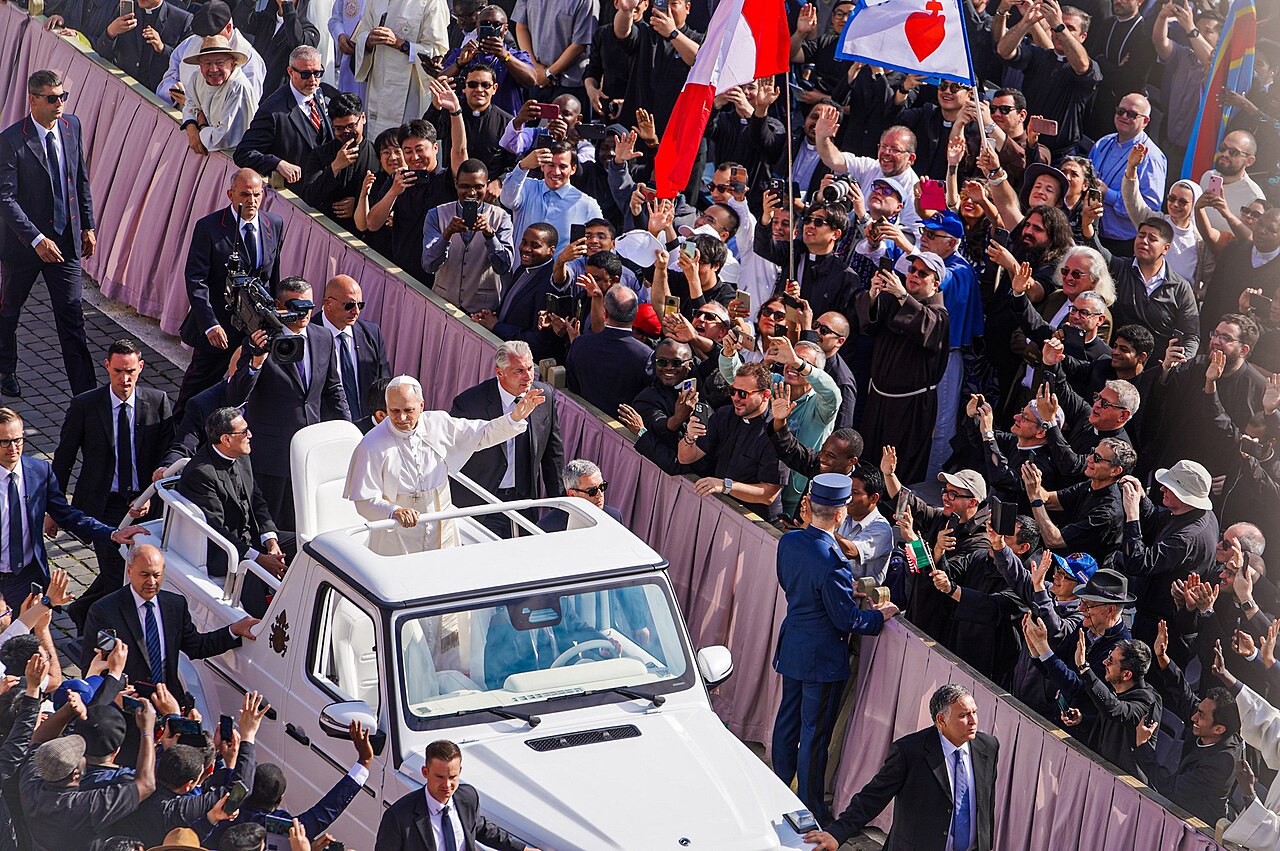 Pope Leo XIV waving from the popemobile at his inauguration in 2025